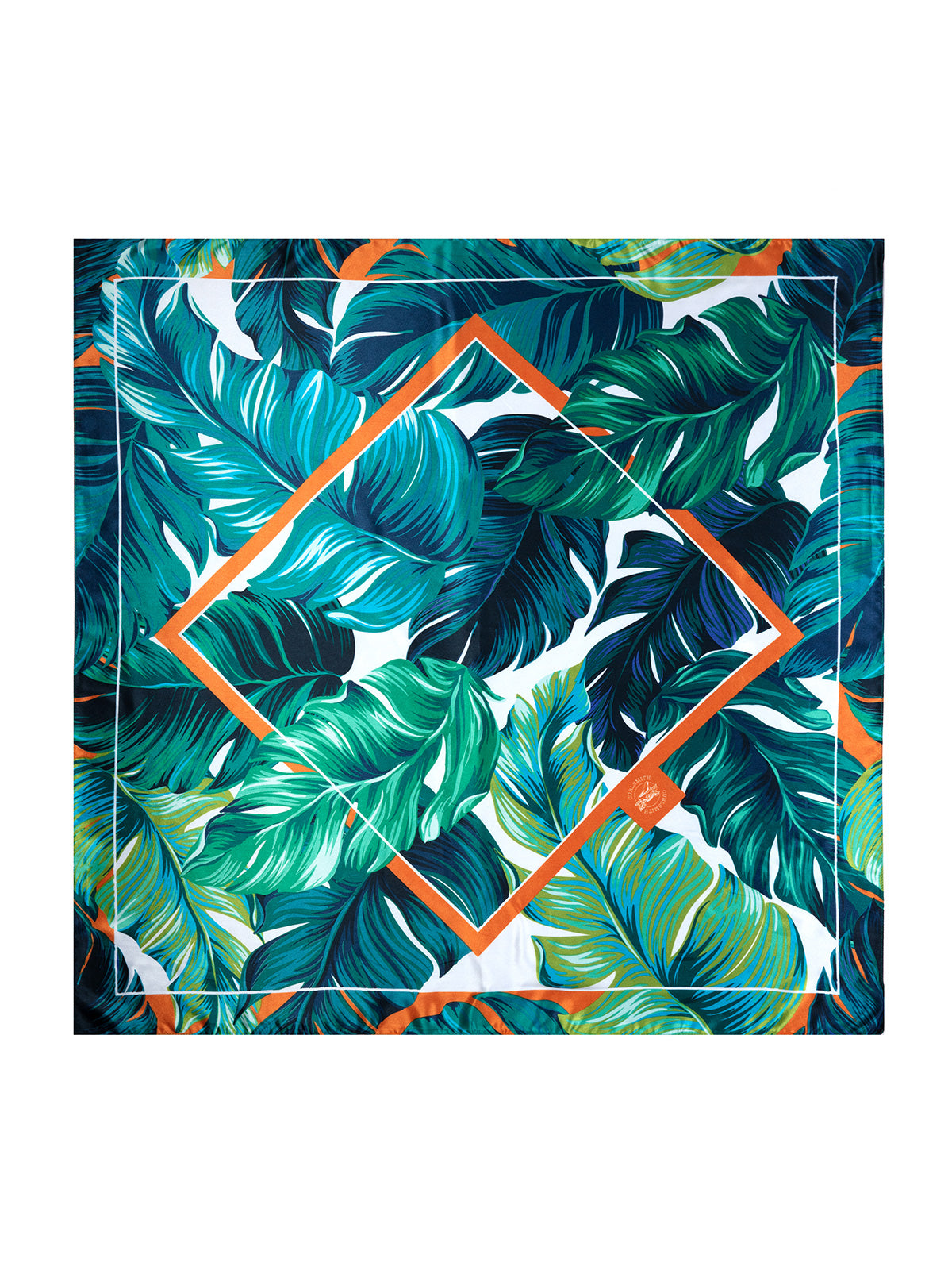 A satin square head scarf with a leaf pattern in shades of green and blue, with an orange geometric border.