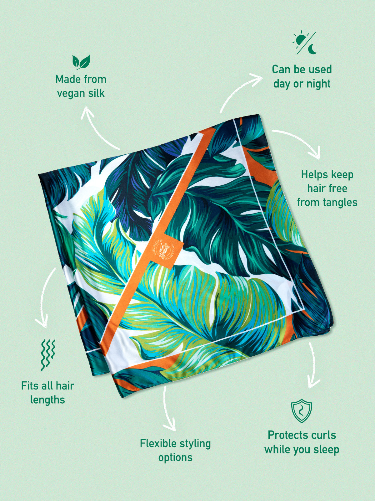 Silk scarf on green background