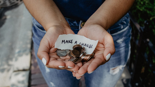 Person with coins in the hands