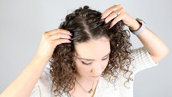 Woman with itchy scalp