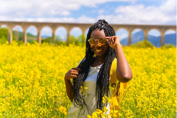 Person with braids in nature