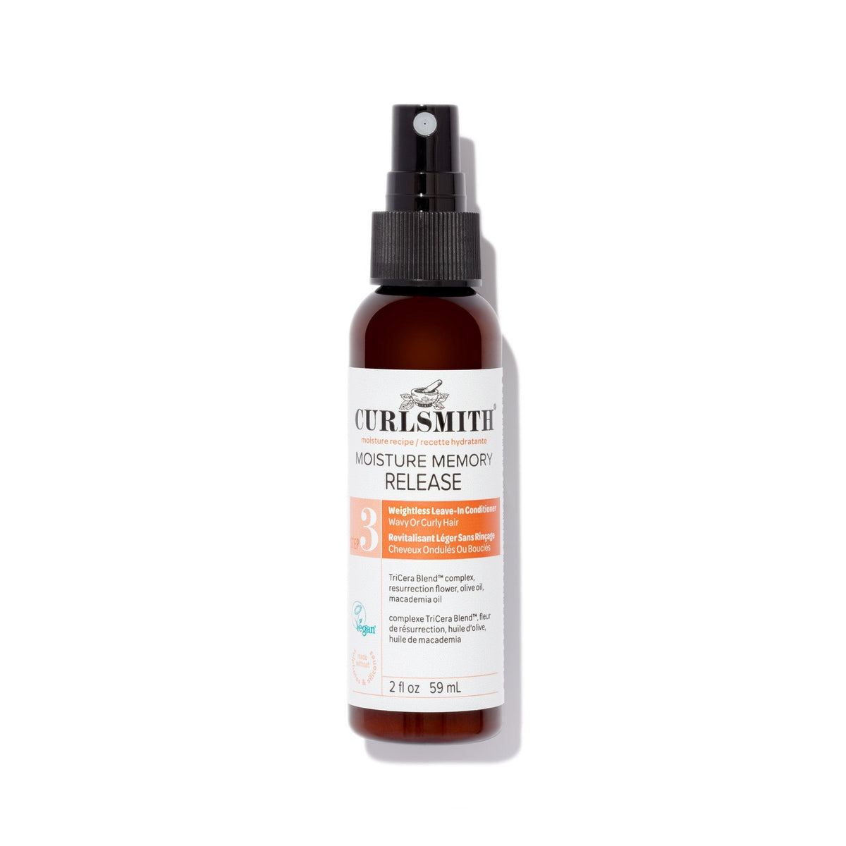 Bottle of Curlsmith hair care product on a white background