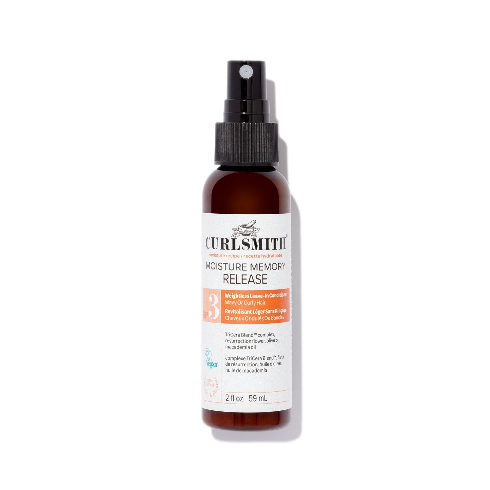Bottle of Curlsmith hair care product on a white background