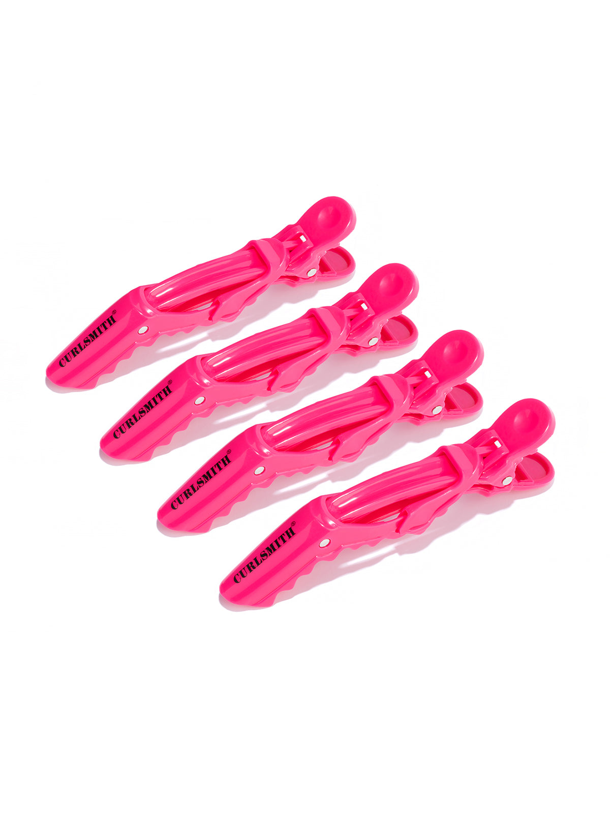 A set of four pink hair clips on a white background.