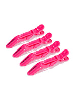 A set of four pink hair clips on a white background.